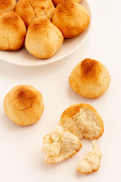 Crunchy Coconut cookies on a white plate