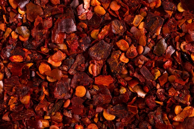 Crushed dried chili pepper red , close-up macro. , copyspace.