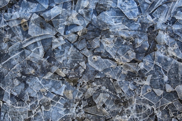 Crushed ice glass cracks background, abstract seasonal\
background, pieces of ice crushed sharp overlay