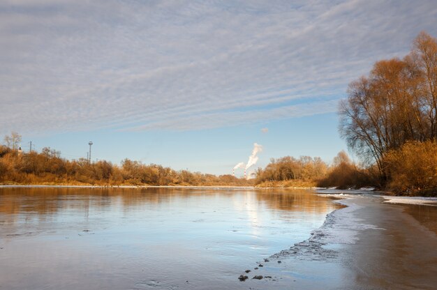 Crust of ice covering  river in frosty day