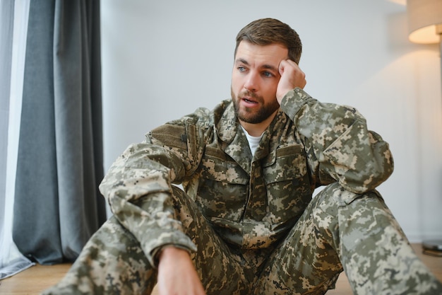 Crying professional soldier with depression and trauma after war