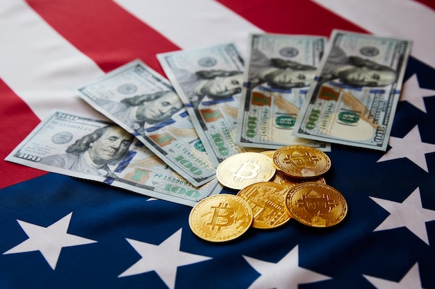 Cryptocurrency Coins Bitcoin BTC coins crypto currency money of the future Concept of economic crisis USA flag on background