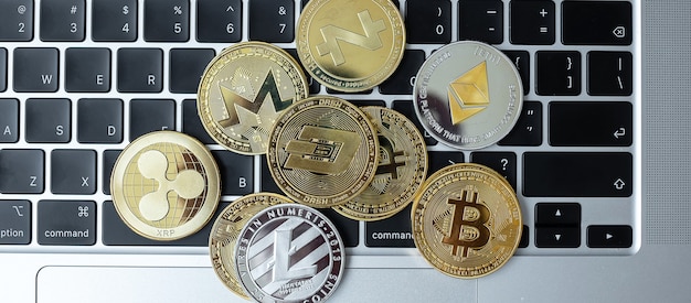 Photo cryptocurrency coins over a keyboard