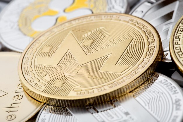 Cryptocurrency coins Monero and other close up