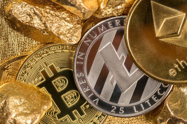 Cryptocurrency golden coins  Bitcoin Ethereum Litecoin on the background of gold nuggets