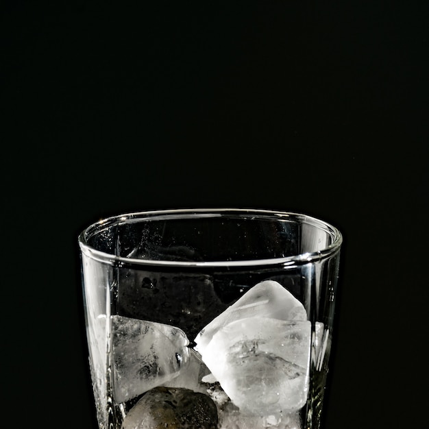 crystal glass witch ice cubes