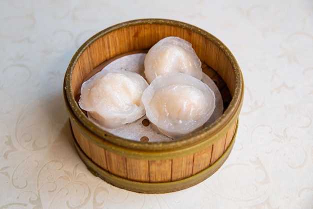 Crystal pyramid dumplings dim sum of traditional Cantonese yumcha dim sum Asian gourmet cuisine mea