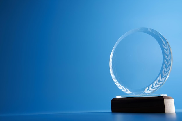 Photo crystal trophy against blue background