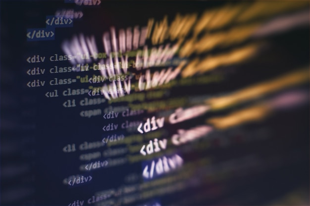 CSS, JavaScript en HTML gebruik. Monitor close-up van functie broncode. Abstracte IT-technologie achtergrond. Softwarebroncode.