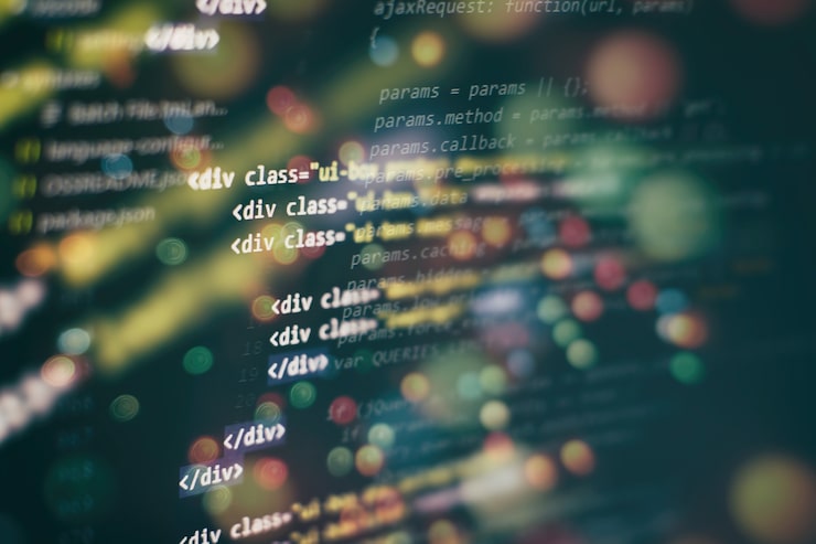 Photo css, javascript and html usage. monitor closeup of function source code. abstract it technology background. software source code.