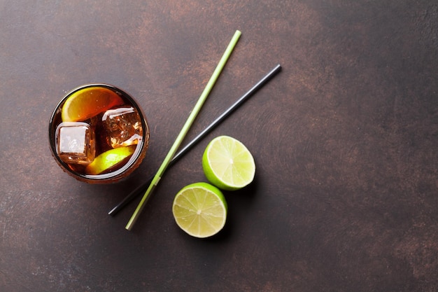 Cuba libre cocktail glass. Top view with copy space