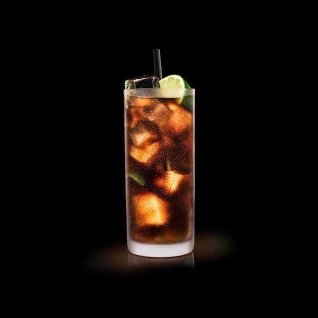 Cuba Libre - Popular Drink on a black surface