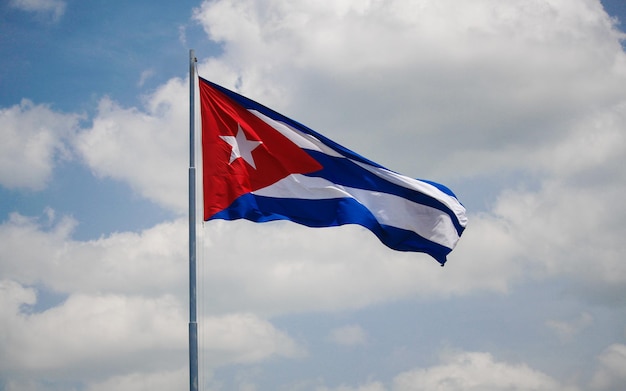 Photo cuban flag waved in the air