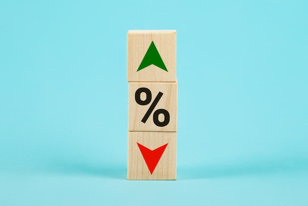 Cube block with percentage symbol icon interest rate financial and mortgage rates concept wood cube