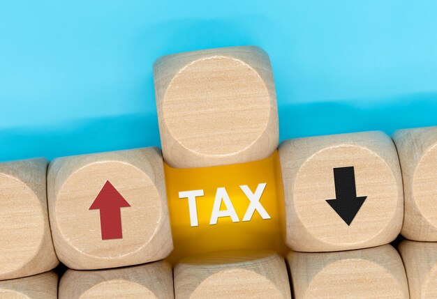 Cube with tax words fears tax hike