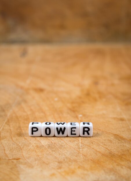 Photo cube words on the wooden table