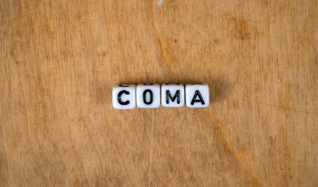 Photo cube words on the wooden table