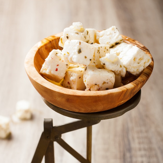 Cubed feta cheese on old scales