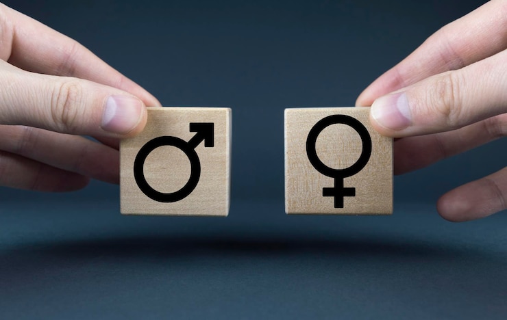 Photo cubes form male and female gender symbols equality concept