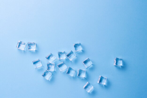 Cubes of ice on a light blue