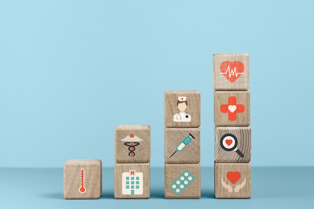 Photo cubes with medical icons and blue background