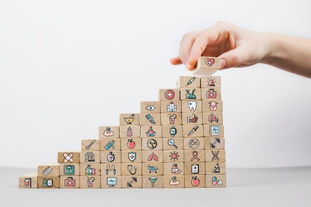 Cubes with medical icons and white background