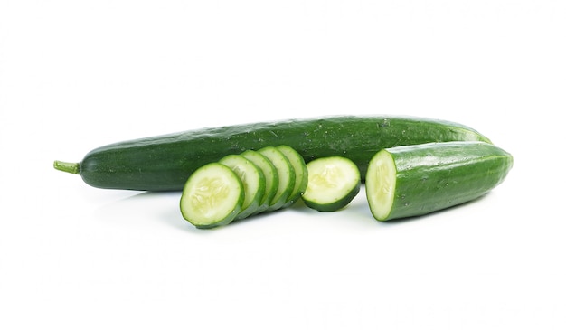 Cucumber and slices isolated over white background