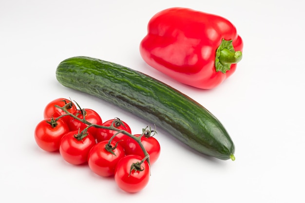 Cucumber, sweet pepper on a white background, isolated