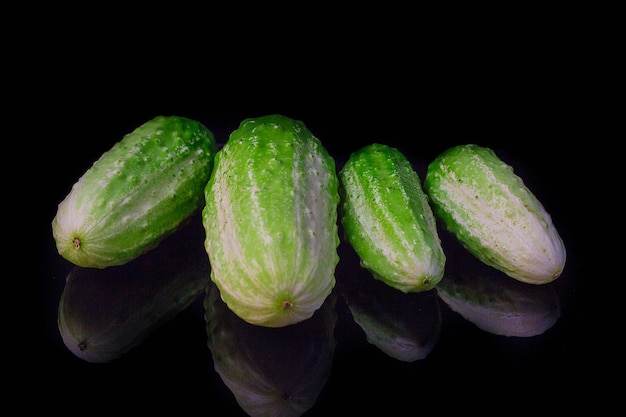 Cucumbers isolated on black background