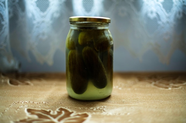 Огурцы в банки на столе