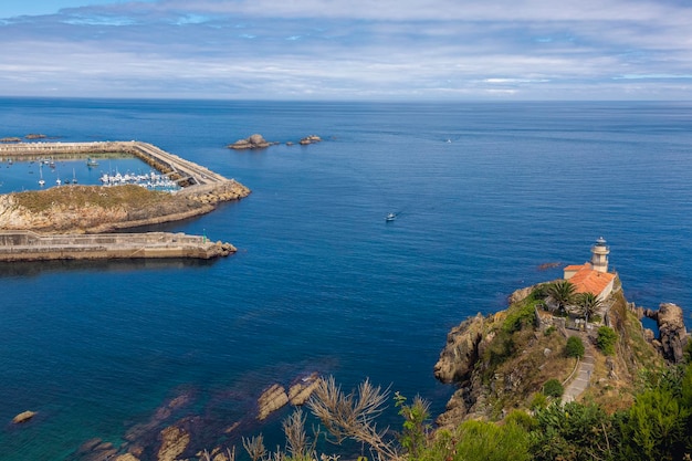 Photo cudillero view from a viewpoint of the lighthouse and the port