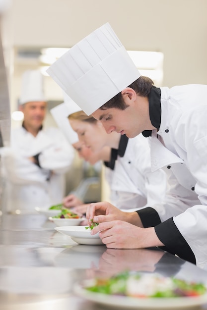 Culinary class preparing salads