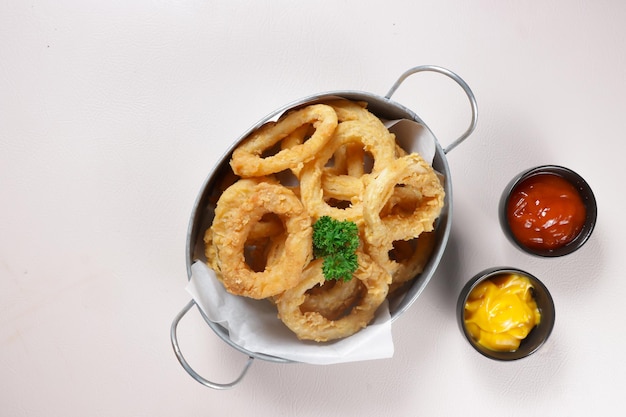 Cumi Goreng Tepung or Crispy Calamari rings or Fried Squids with Sauce.