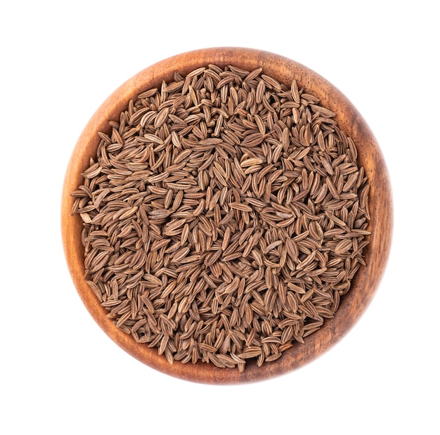 Cumin seeds in wooden bowl