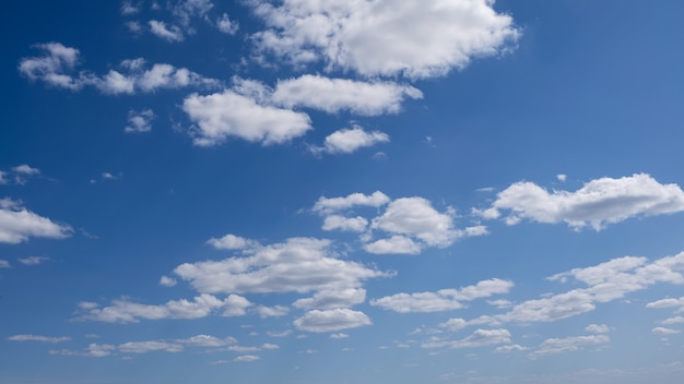 Cumulus clouds with blue sky on a sunny day of summer