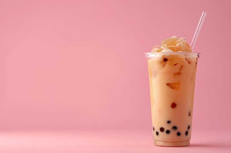 Photo a cup of bubble boba milk tea on pink background banner for restaurant