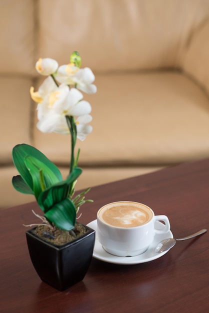 A cup of cappuccino in the hotel room