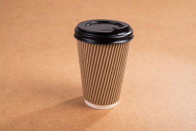 Cup of cappuccino with lid