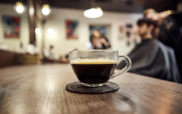 Cup of coffee in barbershop Client service