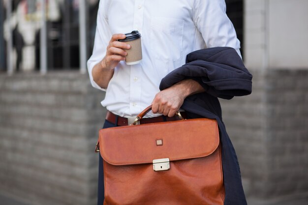 Cup Of Coffee And Briefcase Closeup Shot