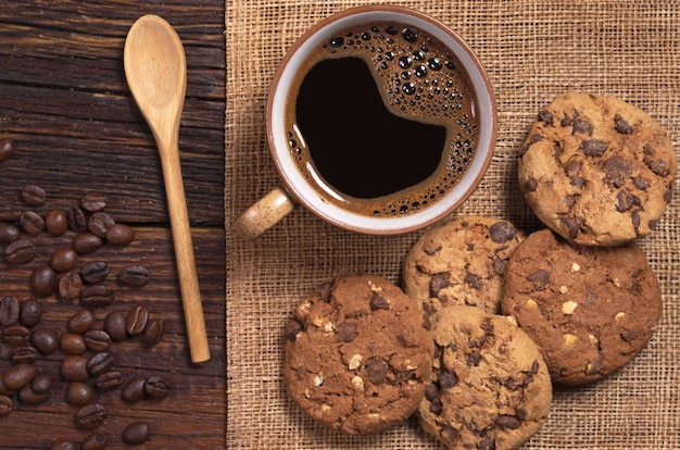 Cup of coffee and chocolate cookies