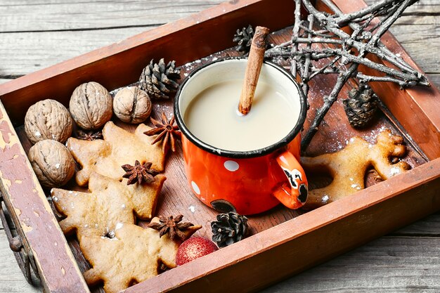 Cup of coffee and christmas symbol in wooden box