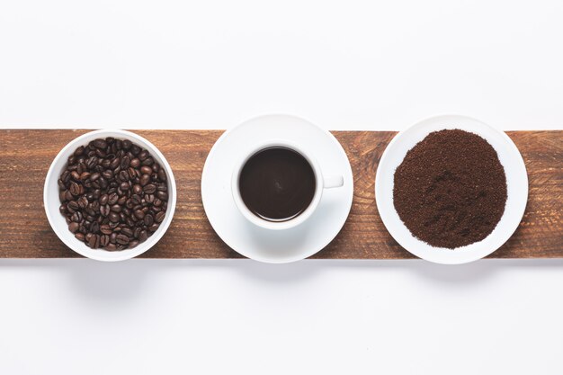 Cup of coffee, coffee beans and ground coffee