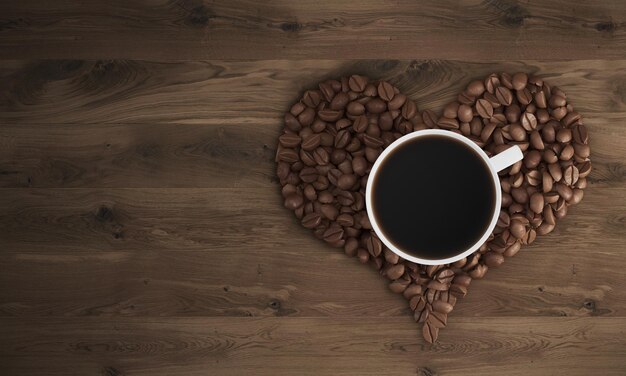 Cup of coffee on coffee heart