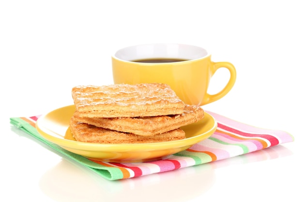 Cup of coffee and cookies isolated on white