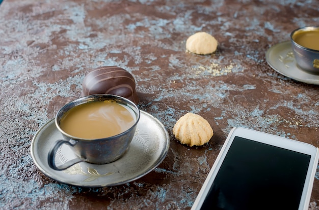 Cup of coffee and cookies