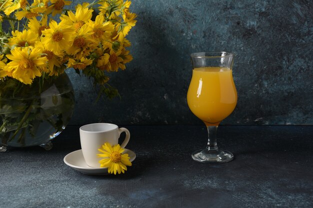 Cup of coffee and a Glass of orange juice. Summer concept