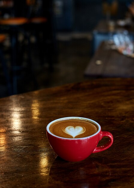 Cup of coffee latte in coffee shop