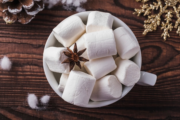 Cup of coffee  marshmallows. Top view. Christmas coffe cup  marshmallows