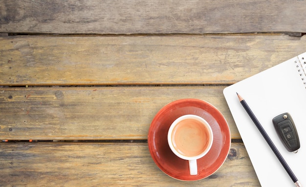 Cup of coffee and note pad